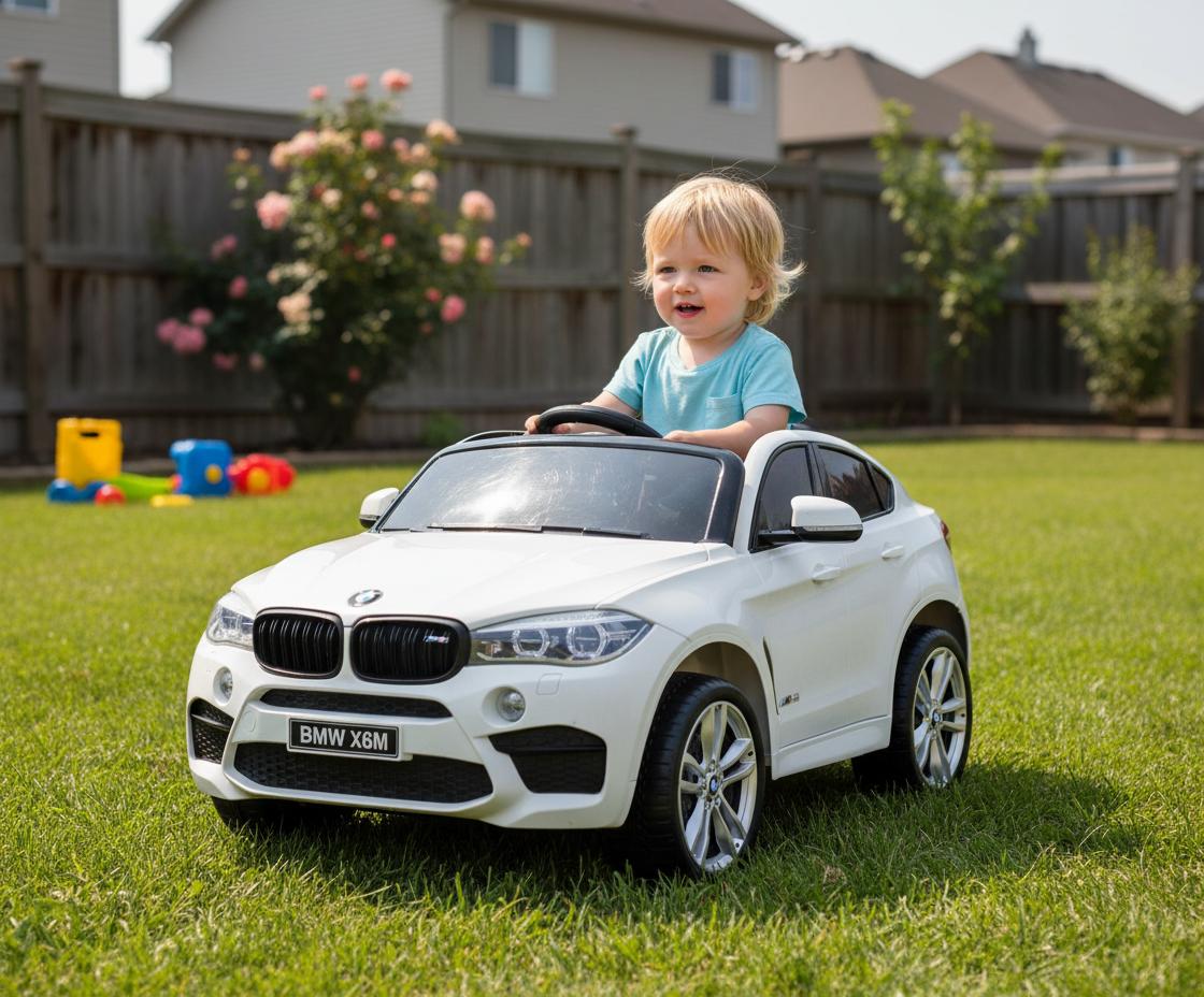 Dziecko w białym BMW X6M na podwórku