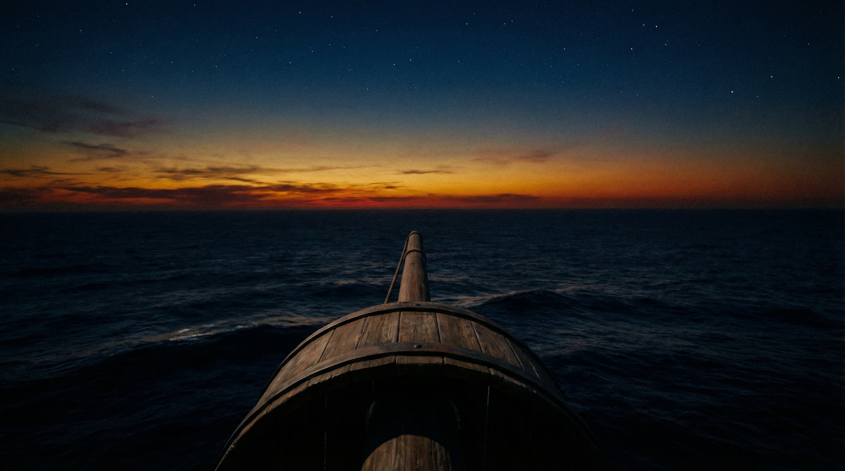 View from a ship's crow's nest looking out over a dark ocean at dusk, the horizon glowing amber
