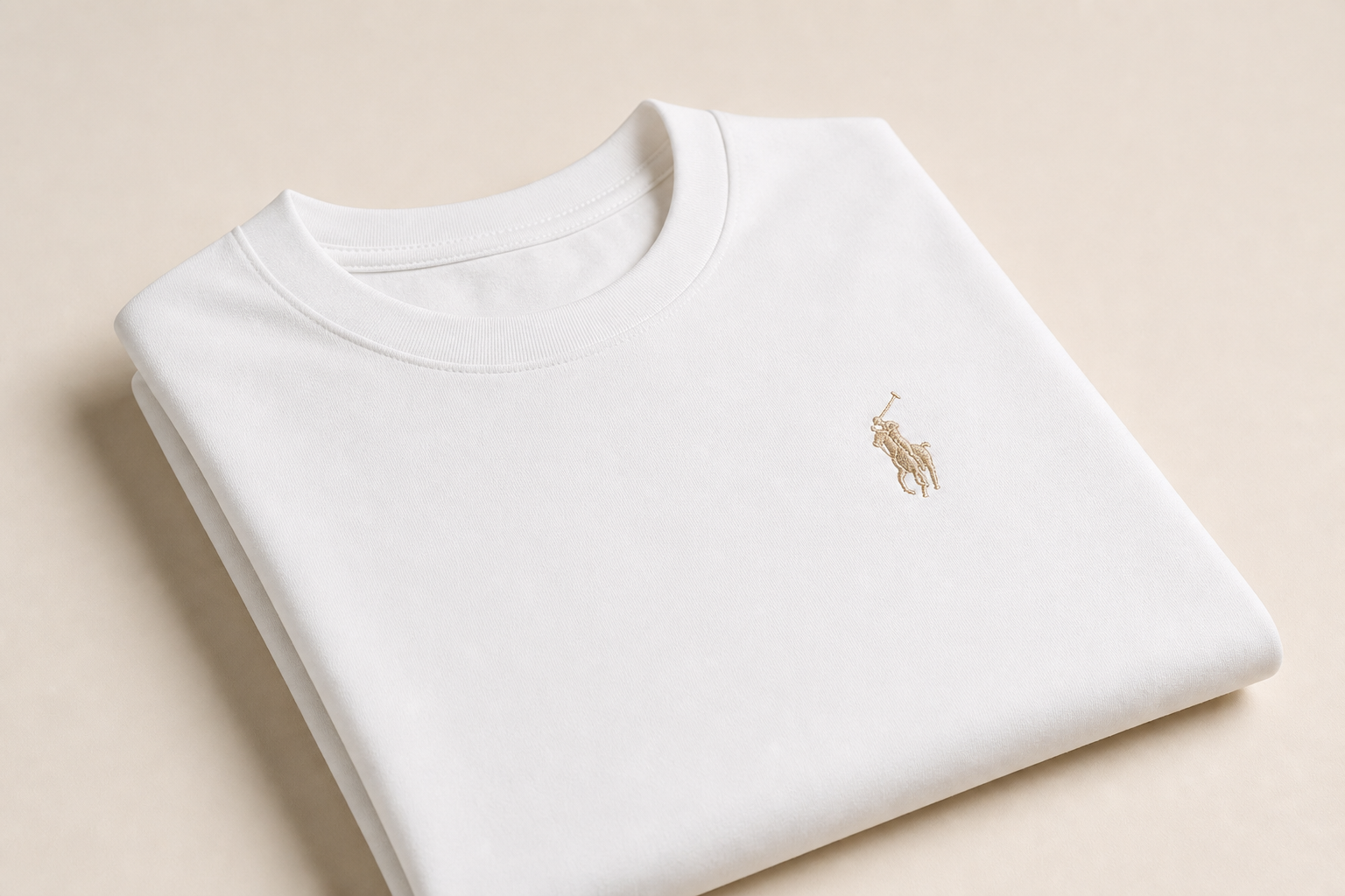 White t-shirt with small embroidered logo on chest