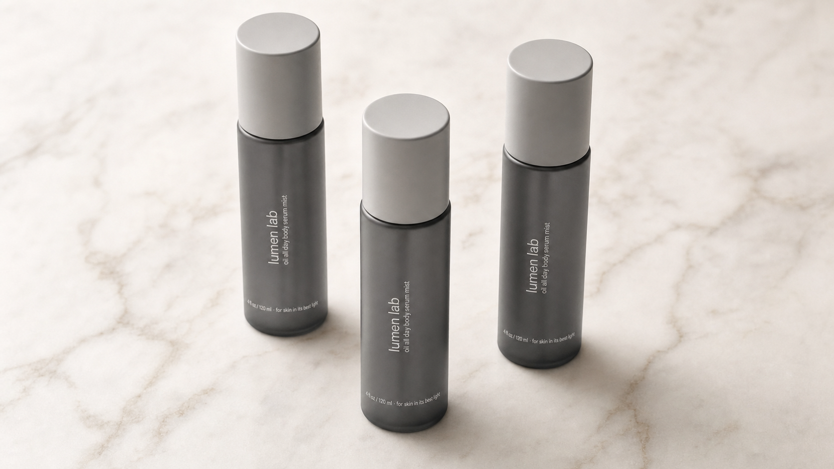 Lumen Lab product packaging three matte charcoal bottles on white marble