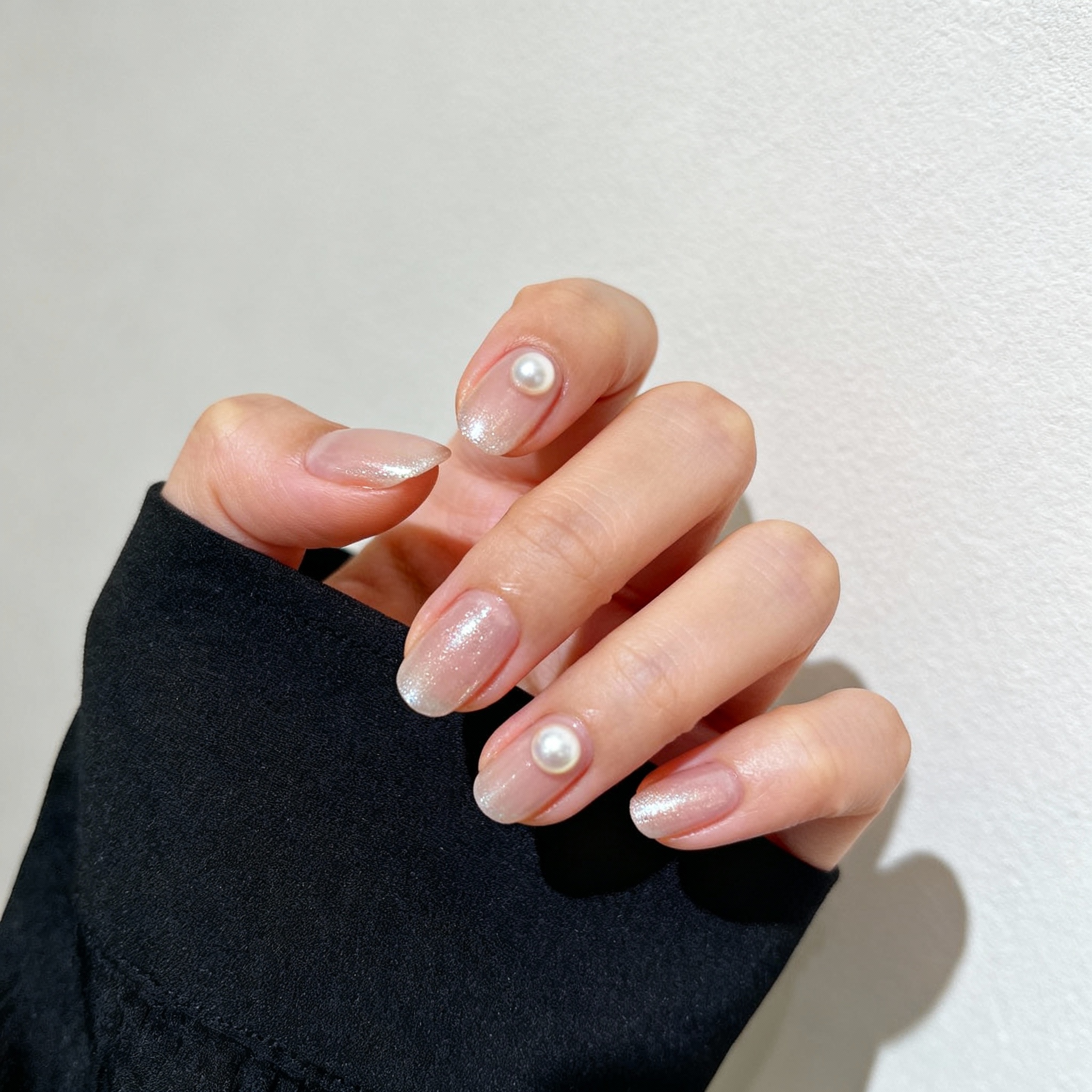 Japanese manicure with natural pearl shine for sophisticated on-camera look